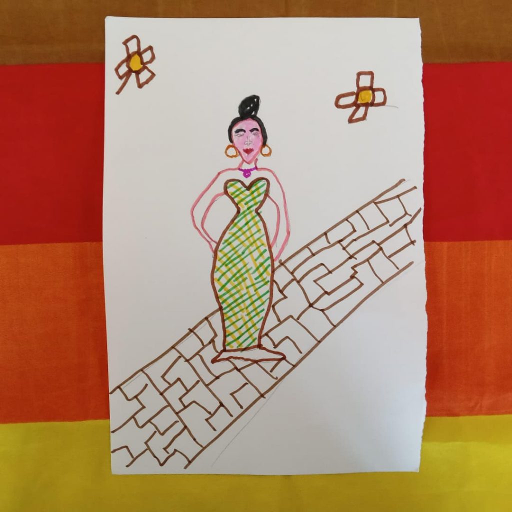 A drawn image of a woman on a path, with her black hair up, wearing a green dress and jewellery